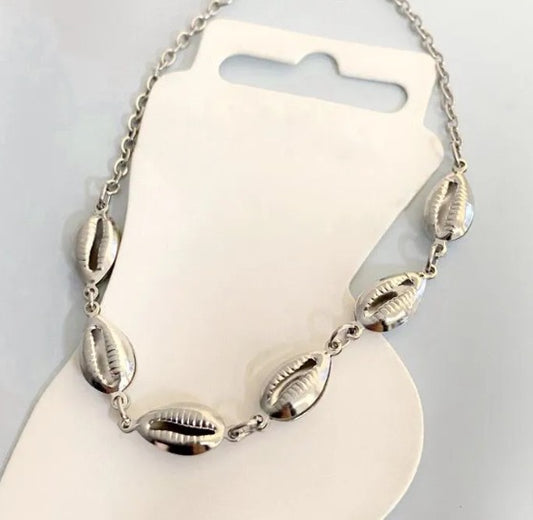 Tornozeleira de aço inox, c/ seis Búzios 23 cm