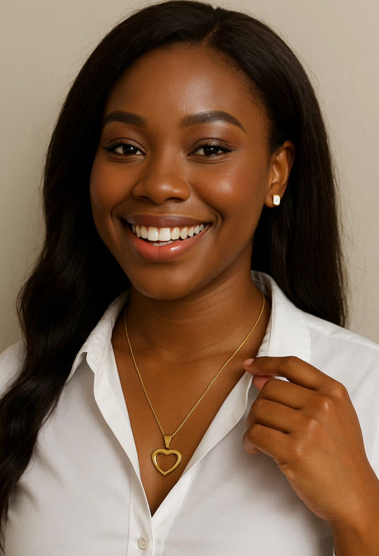 Colar rabo de rato e pingente coração vazado com banho dourado