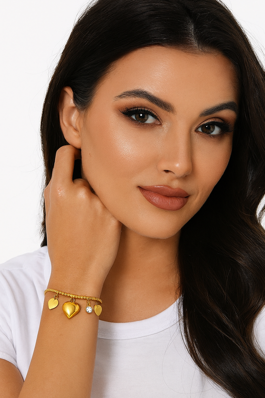 Pulseira de aço inox, banho dourado com corrente serpente com corações e strass 21 cm