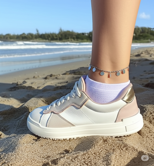 Tornozeleira de aço inox, c/ 7 moedas pequenas 23 cm